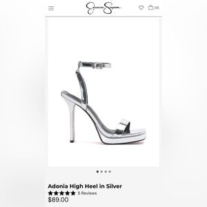 Silver high heel ankle strap platforms. Size 7. Worn once.